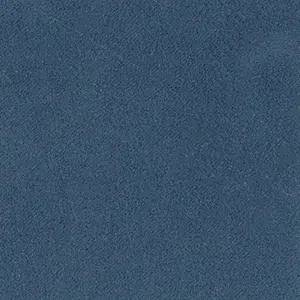 Blue textured background with a subtle grainy surface, close-up view.
